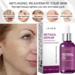 Retinol Fade Fine Lines Serum pump bottle on a marble bathroom counter.