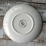 Ceramic dinnerware set with Japanese flat serving plates in floral Nordic design