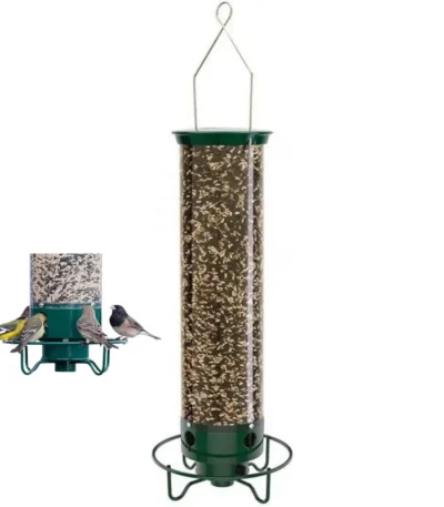 Hanging squirrel proof bird feeder in garden with a chickadee feeding