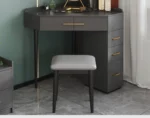 Goldoma modern corner dressing table with mirror and stool in a bedroom