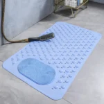 Oblong non-slip bath mat with suction cups on shower floor