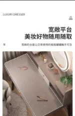Modern white LED makeup vanity table with mirror and stool in a well-lit bedroom