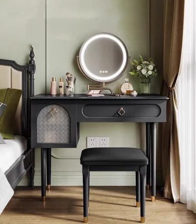 Goldoma compact vanity desk with drawer storage and mirror in a corner bedroom setting