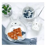 Colorful kids ceramic bowl set with four bowls featuring cute animal designs