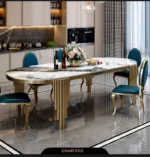 Modern oval marble dining table with gold stainless steel legs seating 6-8 people - Goldoma