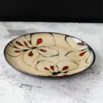 Ceramic dinnerware set with Japanese flat serving plates in floral Nordic design