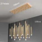 Sputnik-style gold chandelier with multiple arms in a glamorous living room.