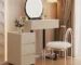 Modern vanity table with mirror featuring a white finish, three storage drawers, and a large rectangular mirror