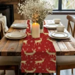 Christmas table runner with elk pattern on a dining table