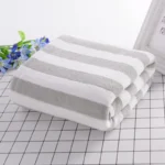 Hotel beauty salon quick-drying beach towel home soft absorbent face towel striped coral fleece bath towel – top view