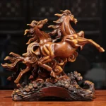 Close-up of the resin horse statue on top of the wine cabinet, showing intricate details and glossy coating.