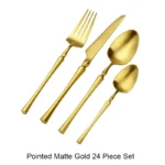Matte black gold flatware set arranged on a table, showcasing elegant cutlery