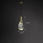 Modern crystal pendant lamp illuminating a dining room with elegant light refraction