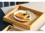 Elegant bamboo serving tray with Japanese-style square design, perfect for serving tea or fruit