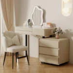 Modern wooden makeup vanity table with mirror and matching stool, featuring a storage drawer for organization