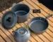 3-piece camping cookware set with pot, pan, and kettle in mesh bag for outdoor cooking