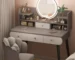 Modern white LED makeup vanity table with mirror and stool in a well-lit bedroom