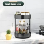 Goldoma rotating spice rack filled with spice jars on a kitchen counter