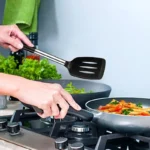 Goldoma silicone spatula set with two heat-resistant spatulas on a nonstick pan