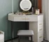 Goldoma modern vanity table with mirror and stool in a corner bedroom setup