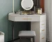 Goldoma modern vanity table with mirror and stool in a corner bedroom setup
