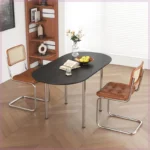 Nordic minimalist folding dining table with stainless steel telescopic extension in a modern living room setting