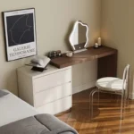 Modern vanity table with mirror and drawers in a bedroom setting