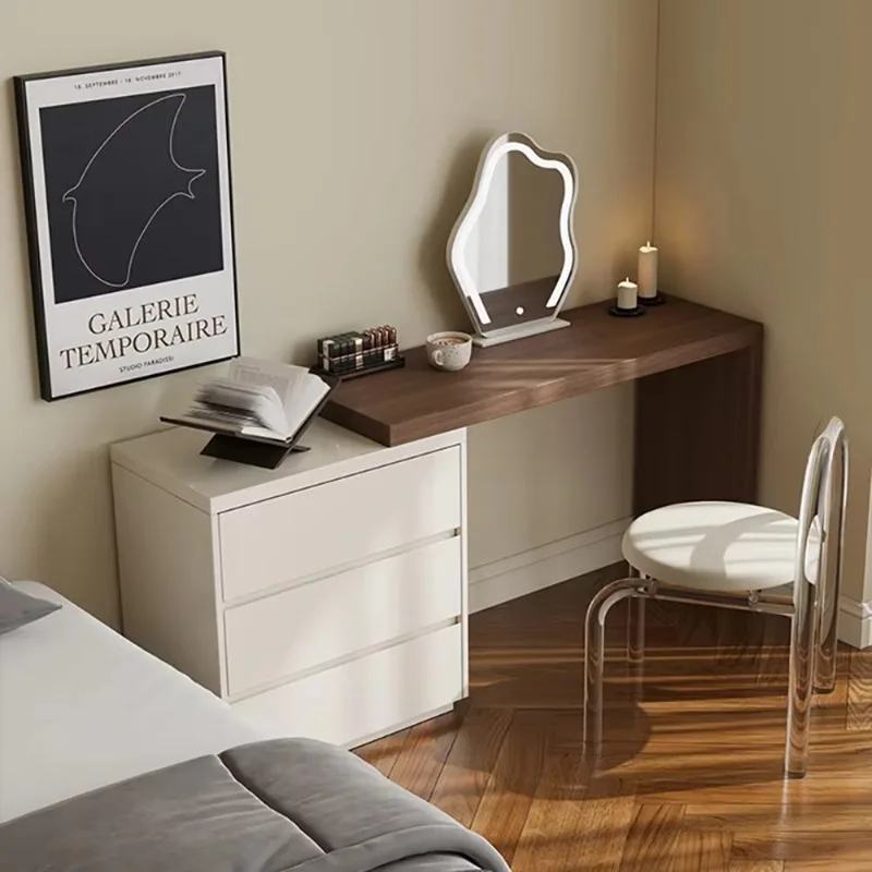 S97be7f15de8b4a7f9a92a1cfa5a83f8dK-7.webp Modern vanity table with mirror and drawers in a bedroom setting