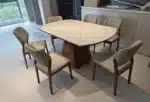 Slate Extendable Round Dining Table – in a cozy room setting