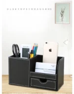 Leather PU multifunctional box with a smartphone and remote control placed inside.