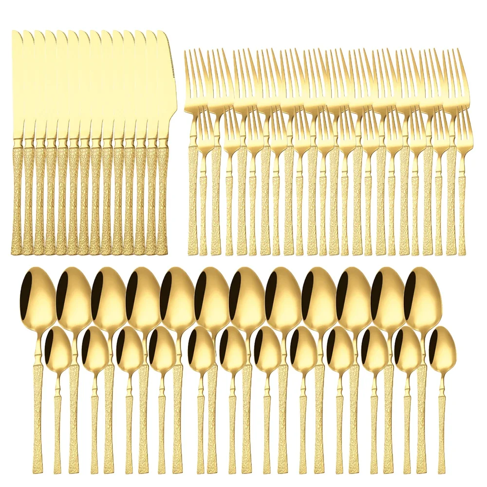 Goldoma stainless steel cutlery set with hammer pattern handles on a wooden table