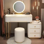 French white wooden dressing table with mirror and stool in a modern bedroom setting