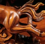 Resin horse statue on wine cabinet, side profile, with cabinet doors ajar showing interior shelves.