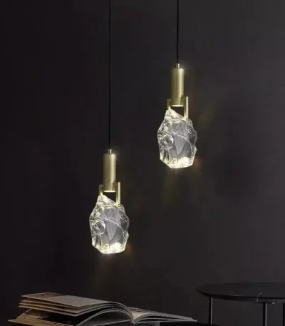 Modern crystal pendant lamp illuminating a dining room with elegant light refraction