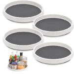 Goldoma rotating spice rack with multiple spice jars on a kitchen counter