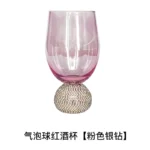 Elegant luxury crystal stemware diamond glass wine goblets on a table setting