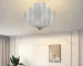 Minimalist iron pendant light in a modern living room setting