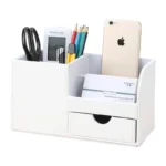 Side view of leather PU pen holder storage box on a clean white desk.