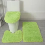 Plush bathroom rug set with toilet lid cover and mat in a cozy bathroom