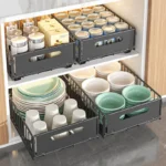 Pull out cabinet organizer holding spice bottles and seasoning jars in a kitchen cabinet