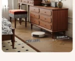 Minimalist oak wood dressing table with mirror, stool, and six drawers in a modern bedroom setting
