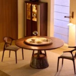 Round mobile dining table with caster wheels - space-saving solid wood table for small dining areas