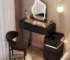 Modern dressing table with mirror and stool in a bright bedroom setting