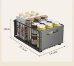 Pull out cabinet organizer holding spice bottles and seasoning jars in a kitchen cabinet