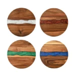 Round acacia cutting board with resin inlay on kitchen counter