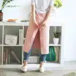 Vintage Washed Cotton Apron Japanese Simple Style Slim Long Apron Baking Cooking Nail Salon Workwear – in a cozy room setting