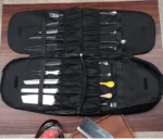 Durable knife carrying case with 21 pockets for chef knives and kitchen utensils