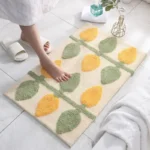 Green leaves flocking non slip bath mat on bathroom floor