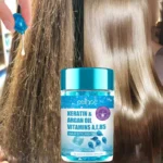 Magic Hair Vitamin Capsule Keratin Oil bottle surrounded by hair care products on shelf