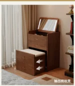 Wooden makeup vanity with mirror and stool in a modern bedroom setting
